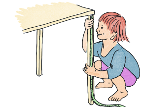 Barn der måler bordben